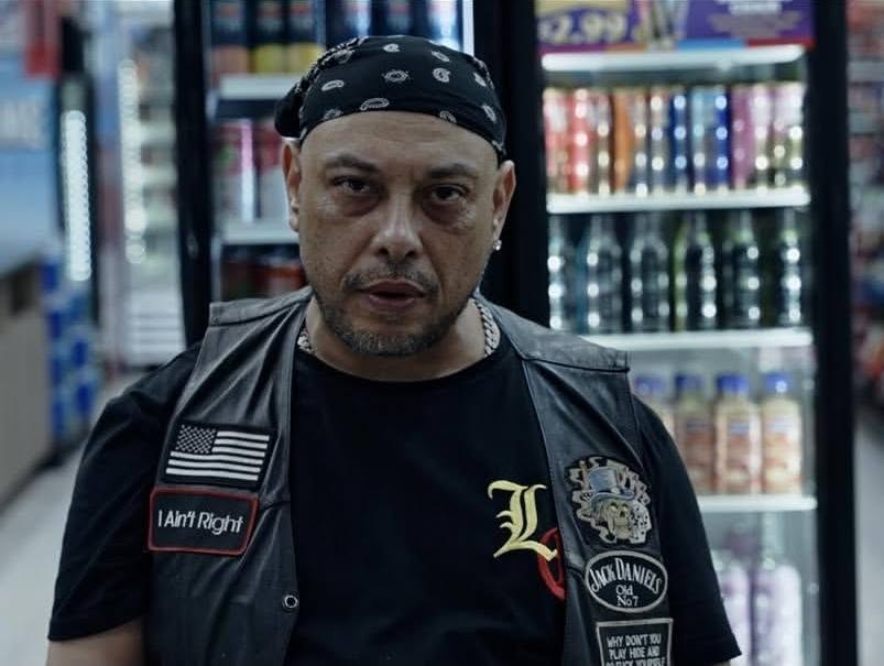 OG POP / Prince of Pain in a storefront